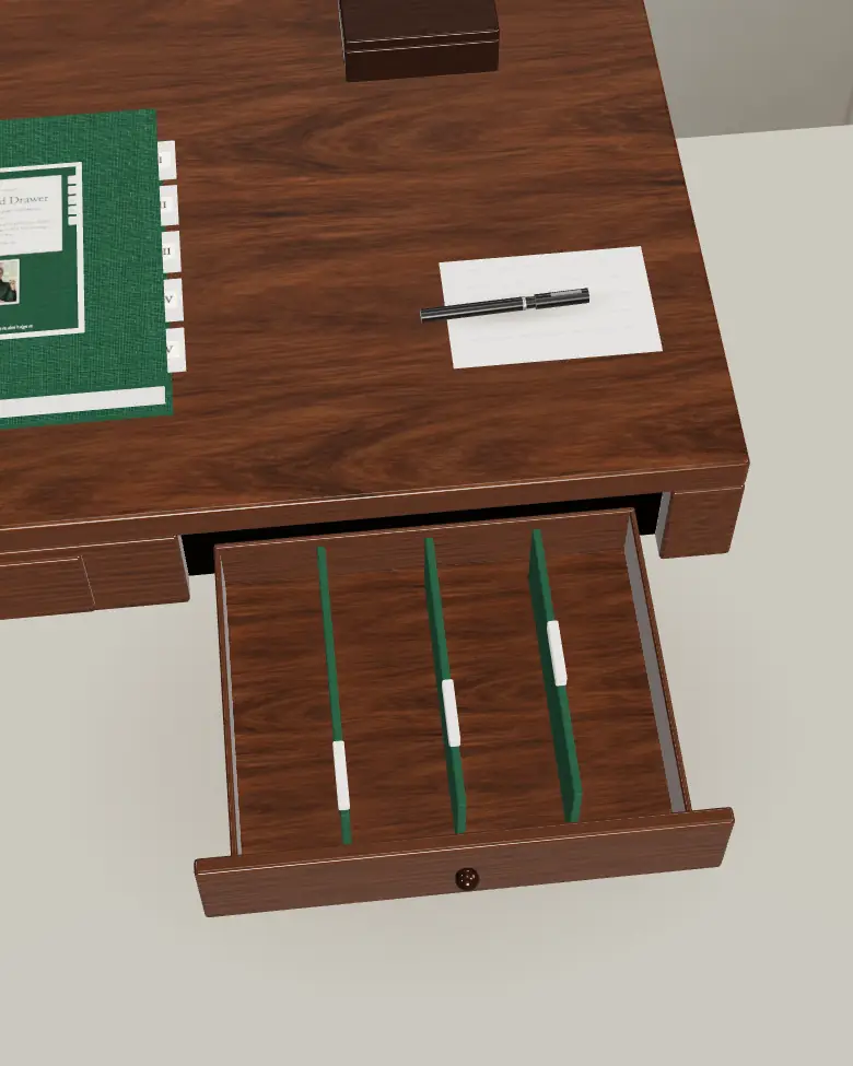 The desk drawer pulled open, with three green folders standing inside.
